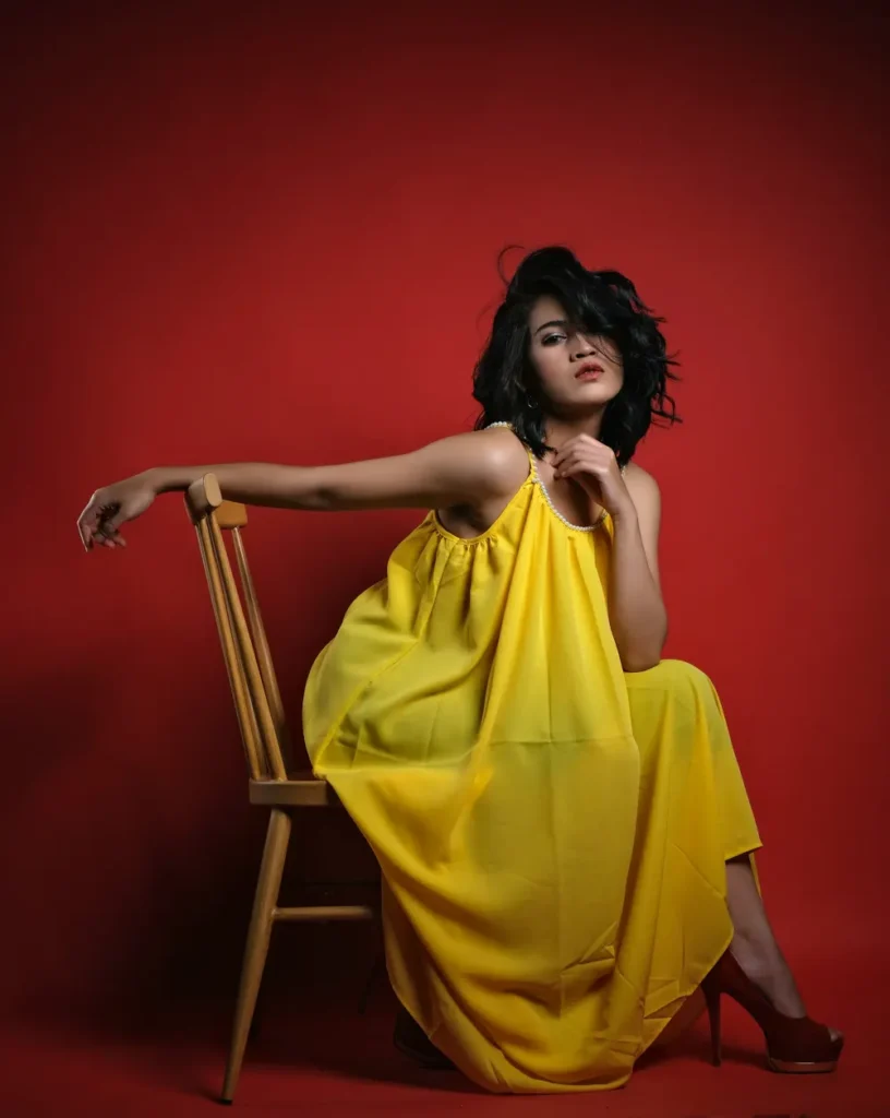 Model in a bright yellow dress